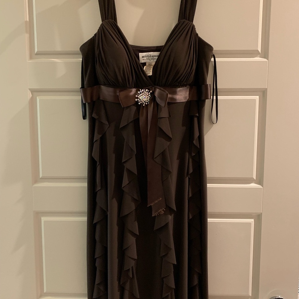 Brown satin ruffled cocktail dress with broach